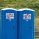 portable toilet in outdoor festival setting