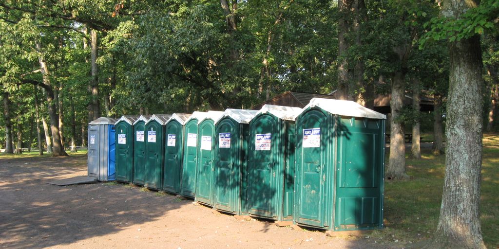 weather-resistant porta potties at outdoor event