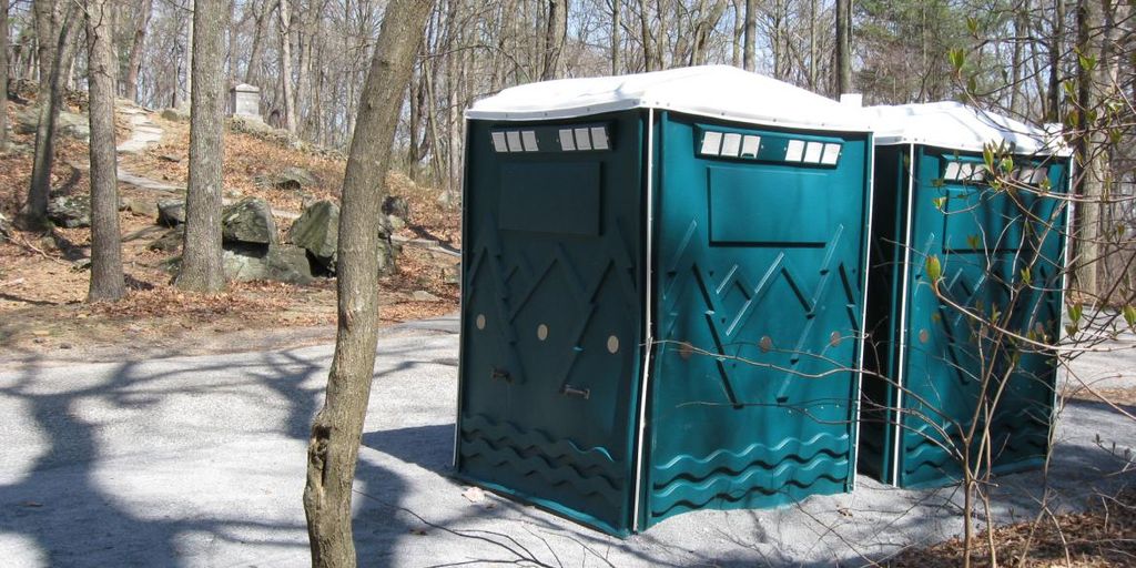 weather-resistant porta potties in various seasons