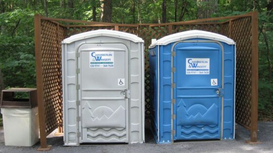 variety of porta potties at an outdoor event